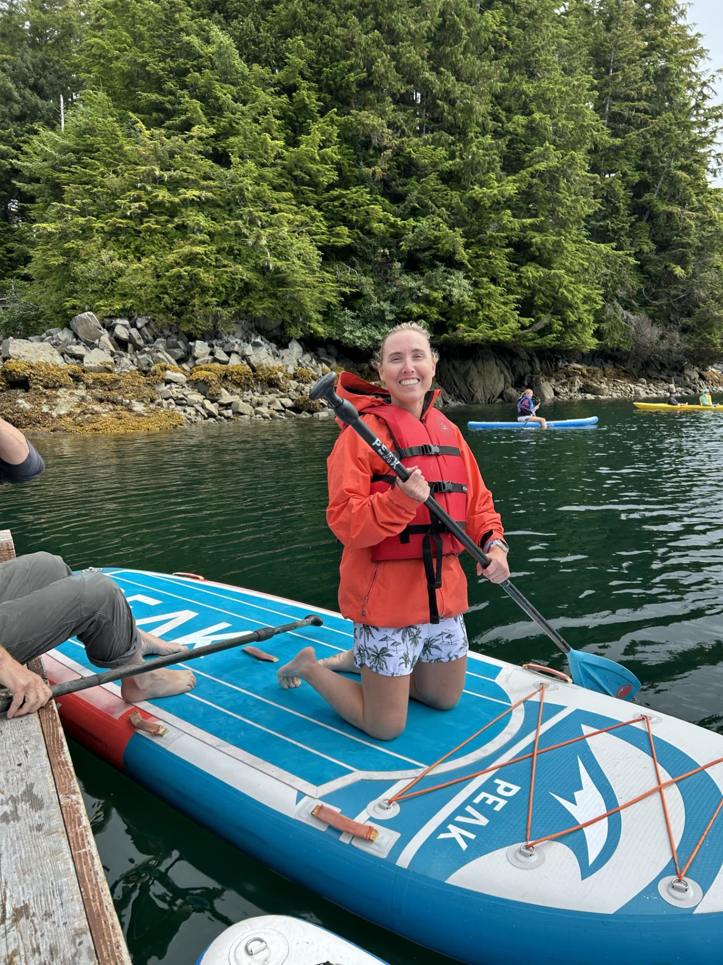 A guest paddleboarding during the Sitka retreat