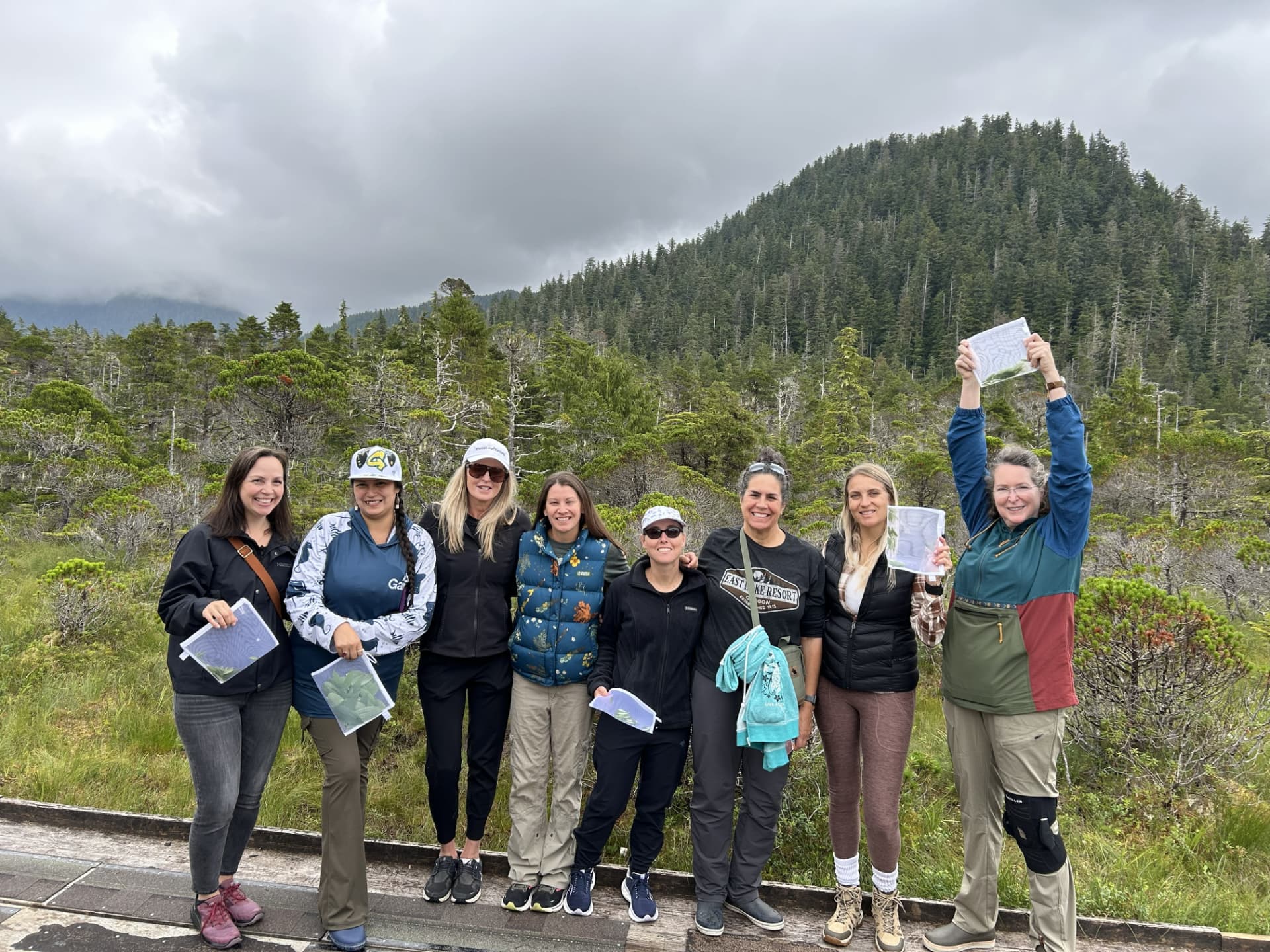A group posing outdoors after a foraging walk