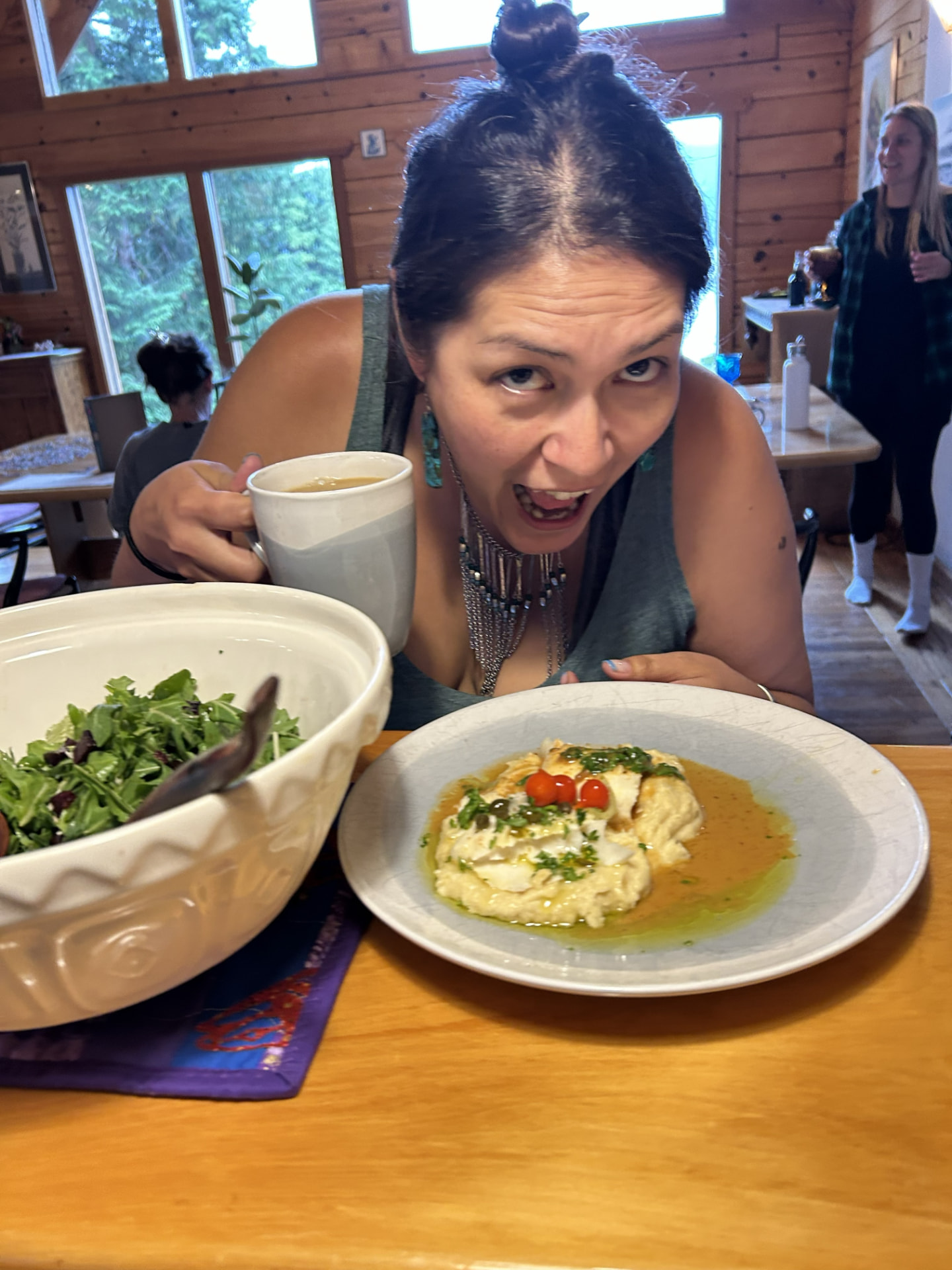 A joyful Wild N Well guest enjoying a beautifully prepared meal