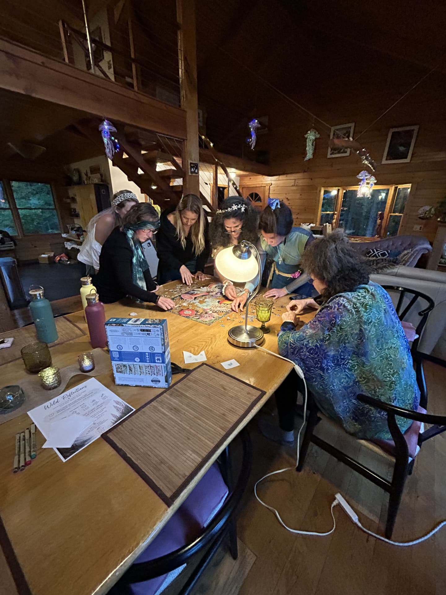 Wild N Well guests solving a puzzle together